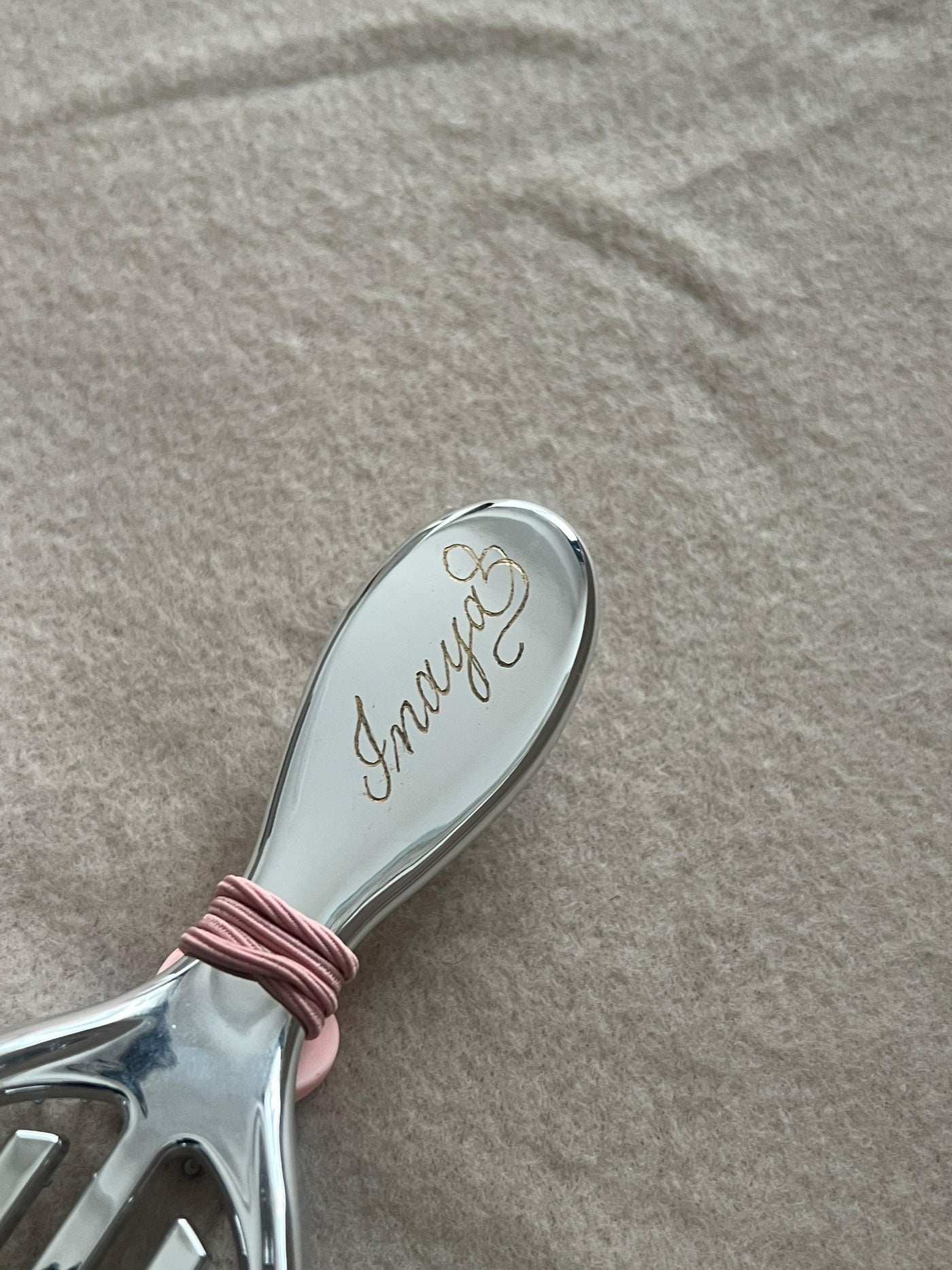 Personalised name engraving on a silver hairbrush
