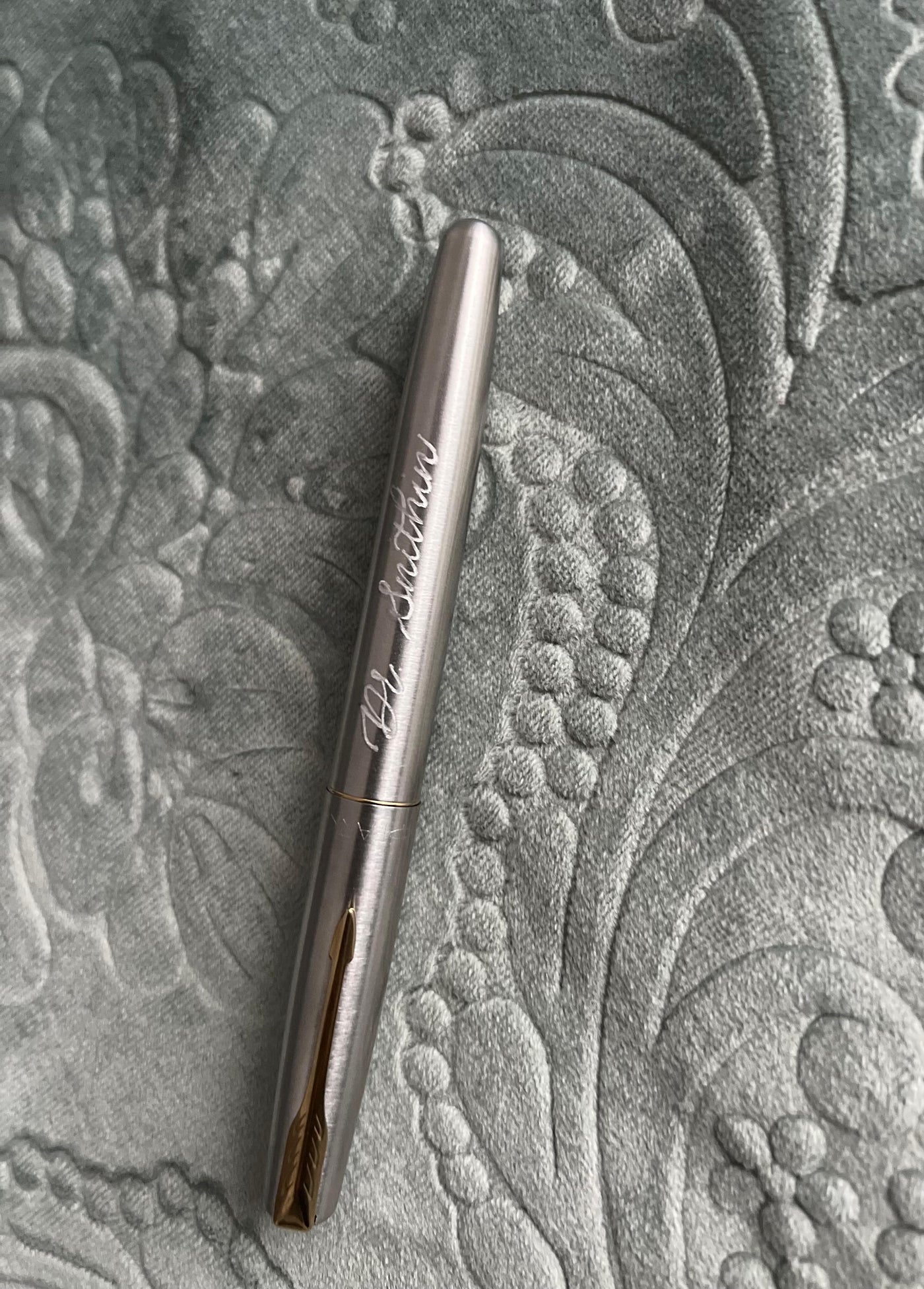 Personalised name engraving on a silver pen