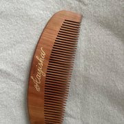 Personalised name engraving on a wooden comb